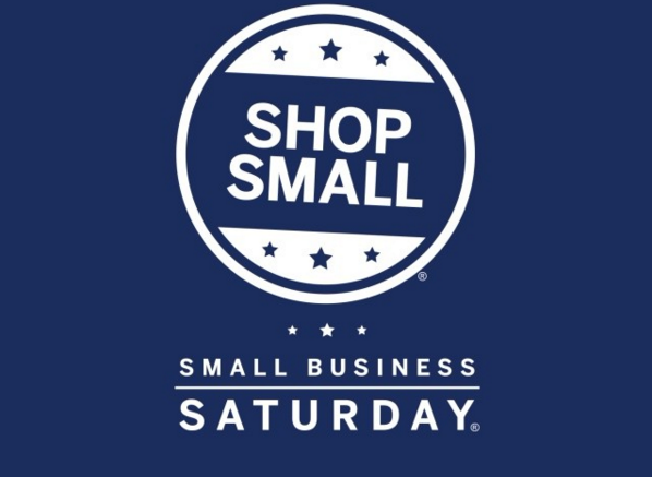 A small business saturday logo with an icon writing "shop small"