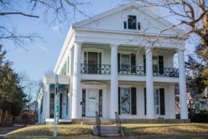 The white building of Verilife, a medical and recreational cannabis dispensary, located on main street in wareham, massachusetts opens today. It has large pillars and is a remodeled old home.
